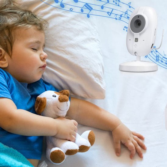Camera bebe avec petit garcon qui dort avec une peluche