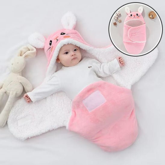 Nid d ange rose ouver avec bebe